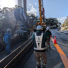 保護中: 2026年1月度安全パトロール。指宿有料道路（Ⅱ期）線形改良工事（R6-11工区）。西日本道路神之川橋下部工。